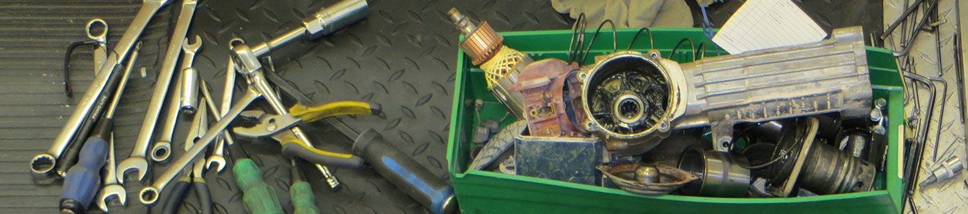 Green box containing repair tools